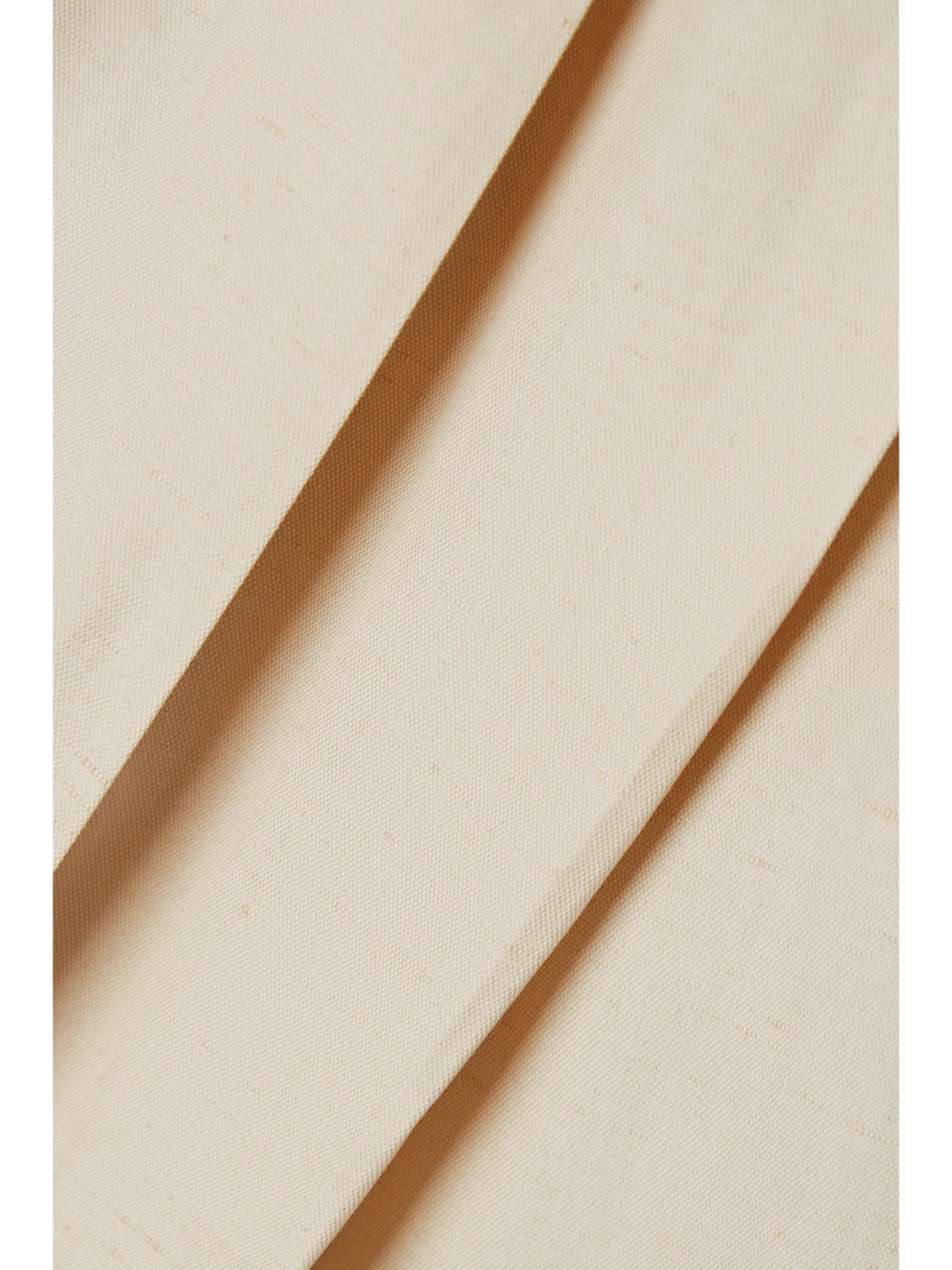 Close-up detail of the Stella McCartney Pleated Crepe Straight-leg Pants