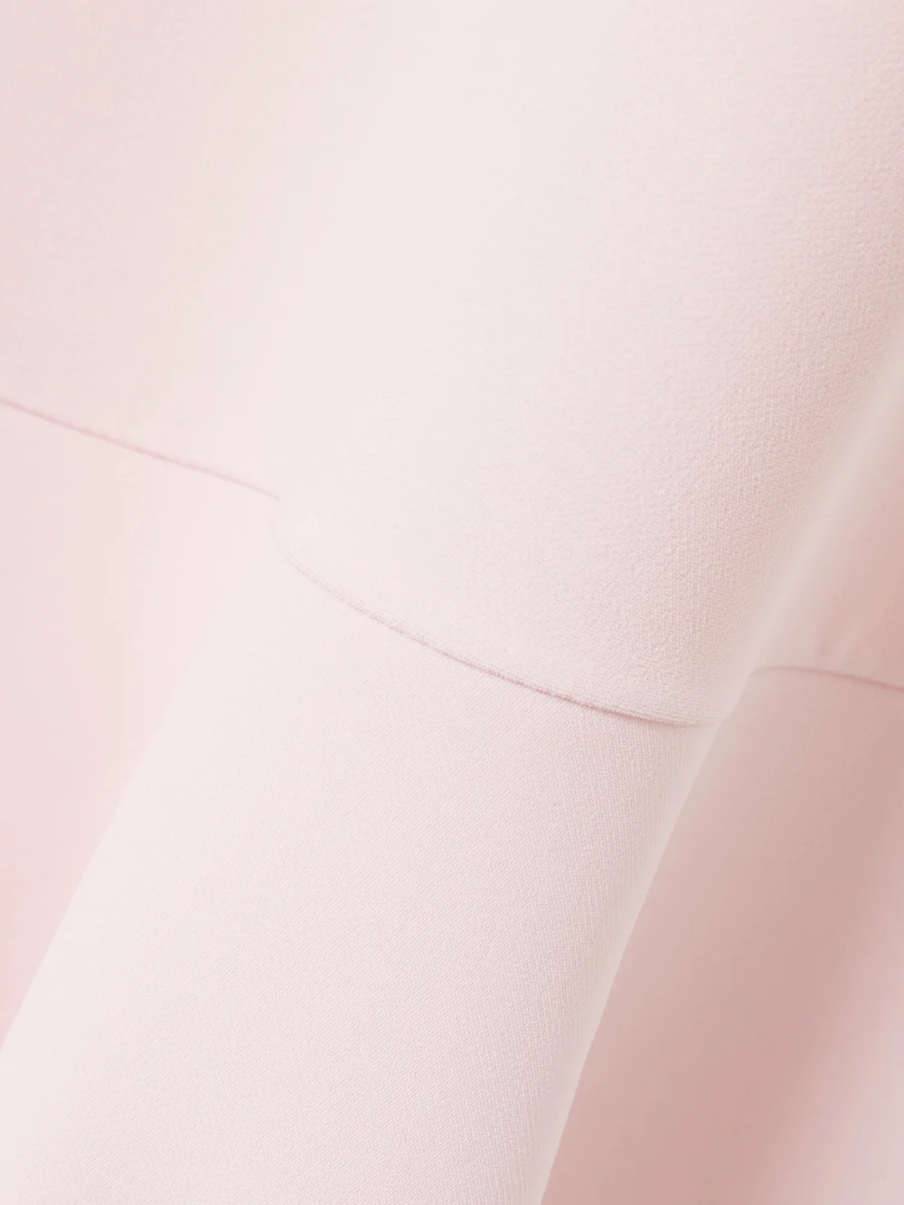 Close-up detail of the Stella McCartney Ruffled Cady Mini Dress