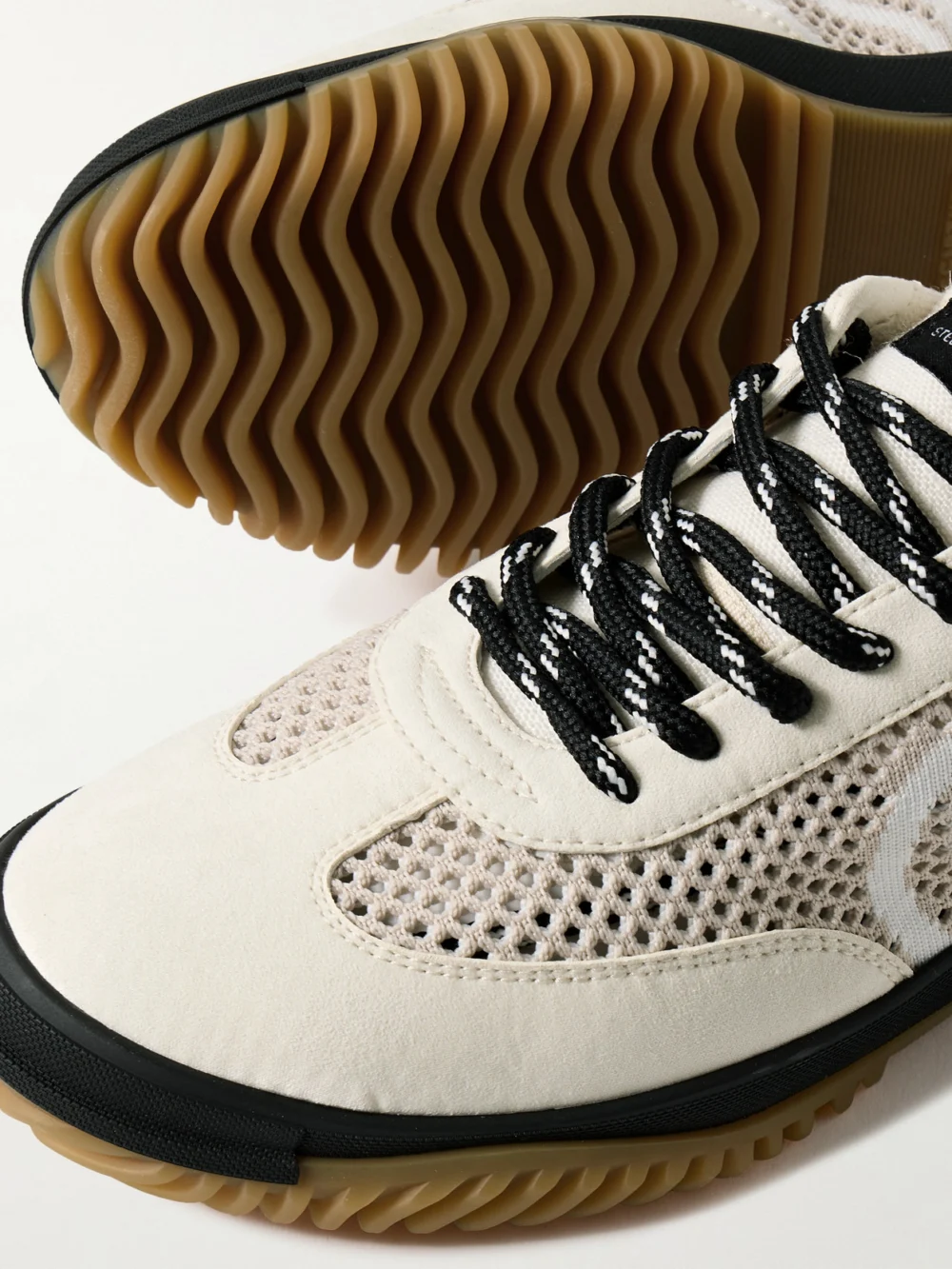 Close-up detail of the Stella McCartney S-wave Sport Recycled-mesh and Vegan Suede Sneakers