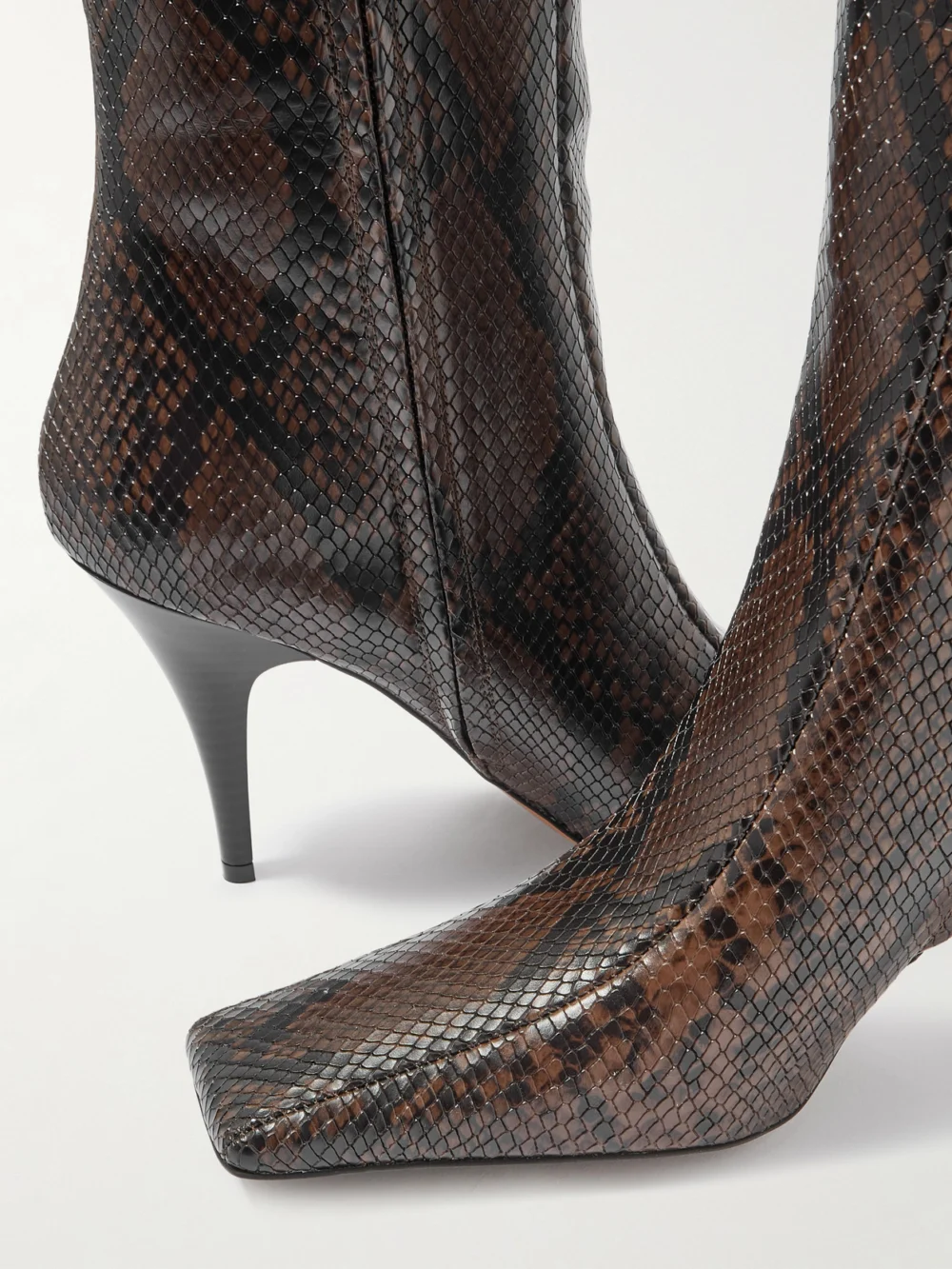 Close-up detail of the Stella McCartney Snake-effect Vegan Material Knee-high Boots