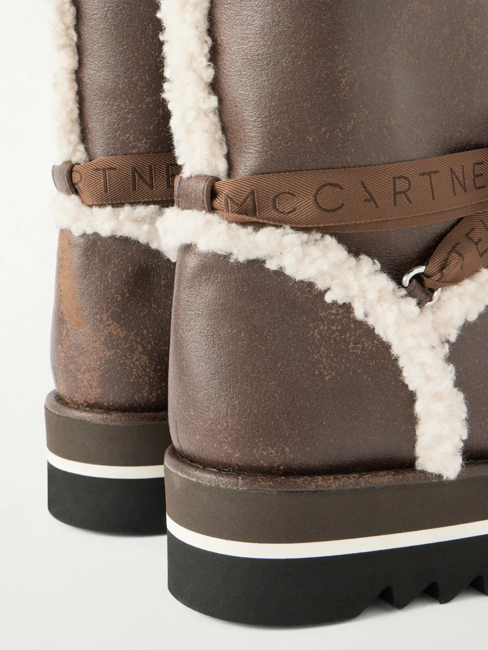 Close-up detail of the Stella McCartney Sneak-elyse Fleece-trimmed Vegetarian Boots