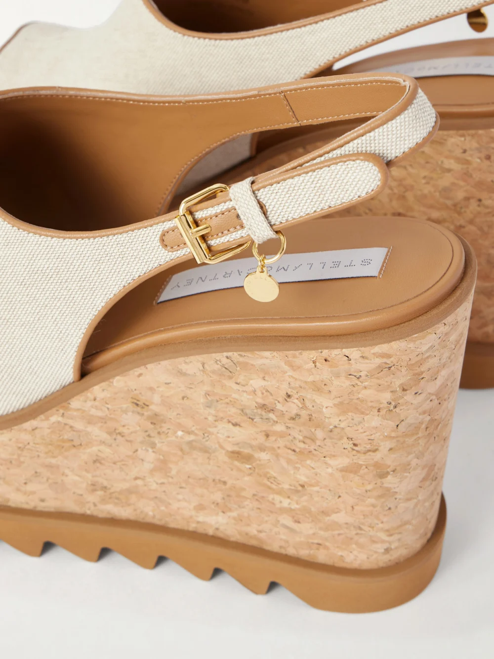 Close-up detail of the Stella McCartney Sneakelyse Canvas Slingback Platform Wedge Sandals
