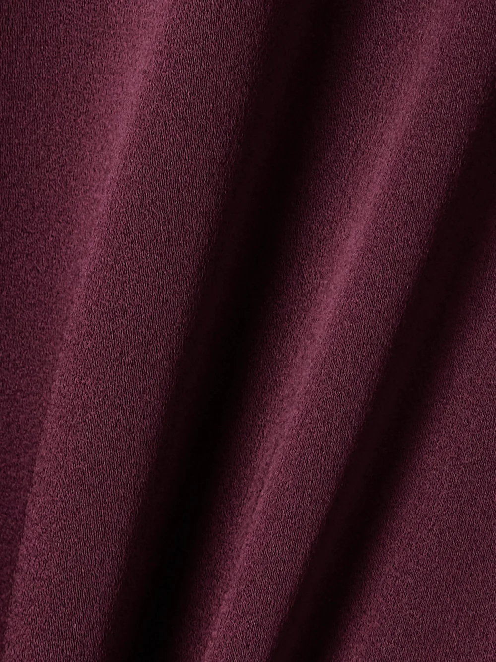 Close-up detail of the Stella McCartney Twist-front Satin Midi Dress
