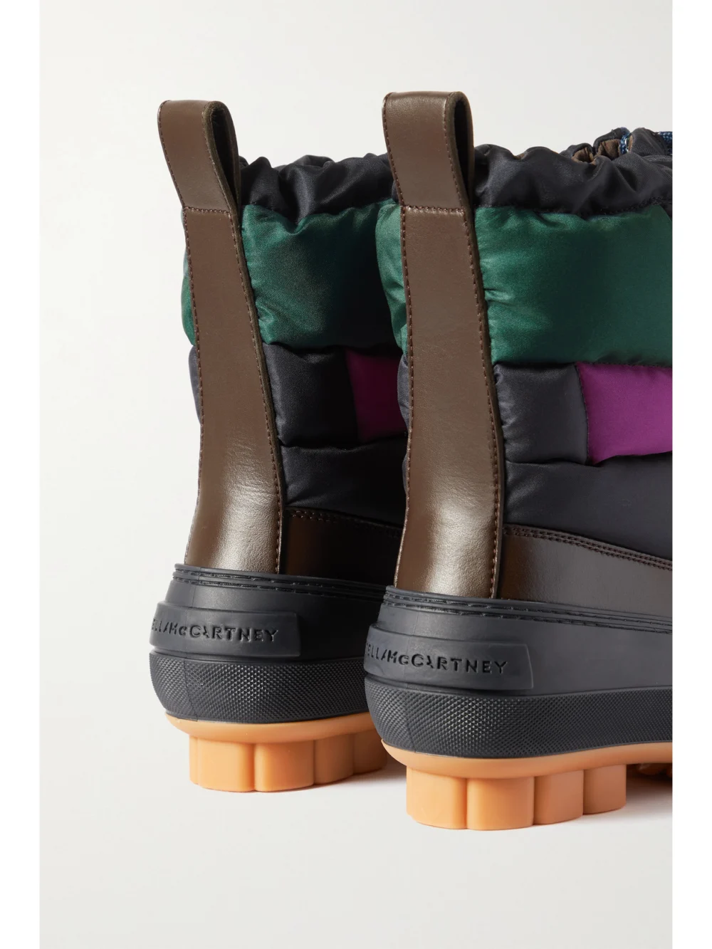Close-up detail of the Stella McCartney Vegetarian Material-trimmed Rubber and Quilted Recycled Shell Ankle Boots