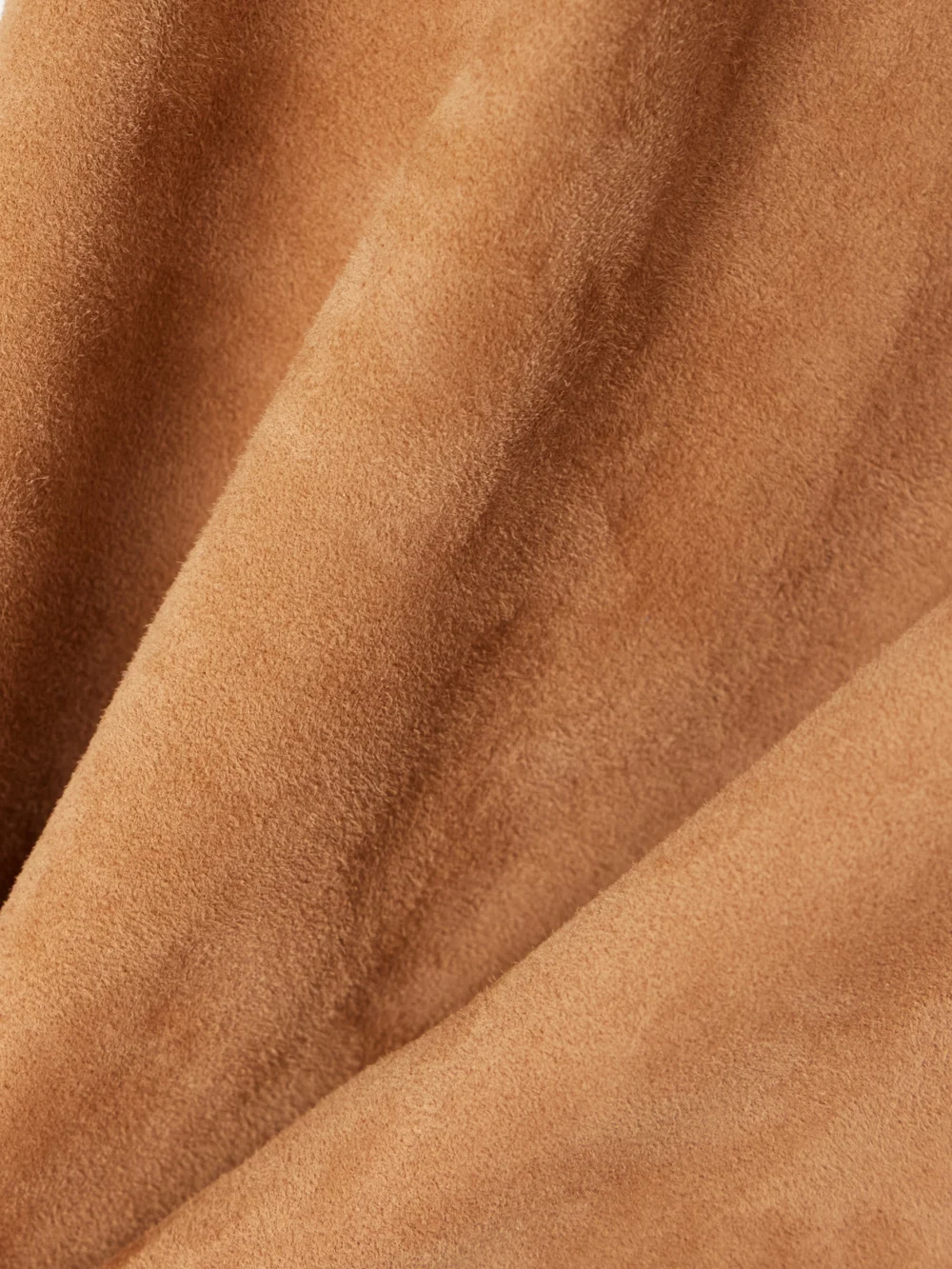 Close-up detail of the Stouls Jacky Cropped Stretch-suede Leggings