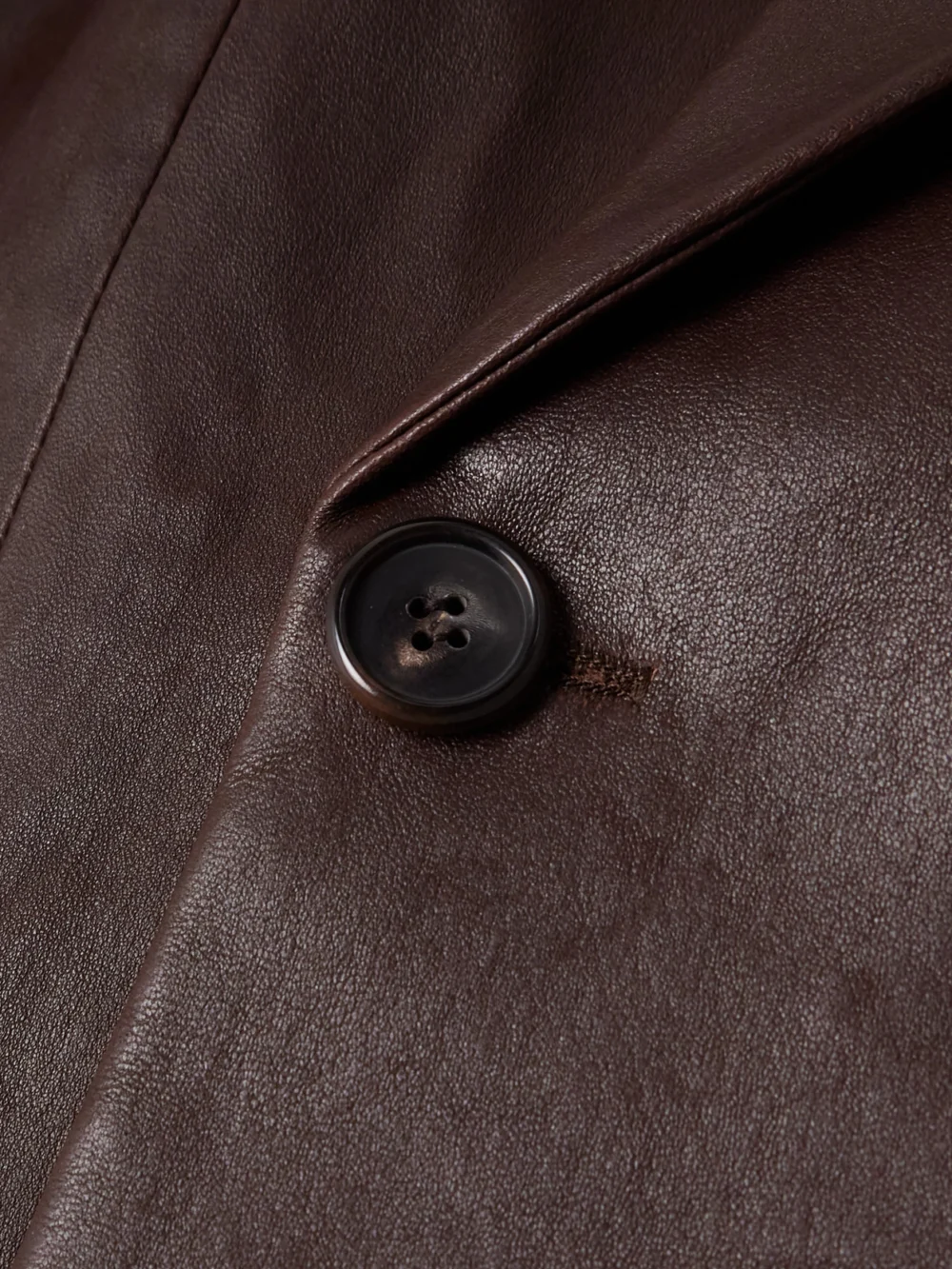 Close-up detail of the Stouls Jones Double-breasted Leather Blazer