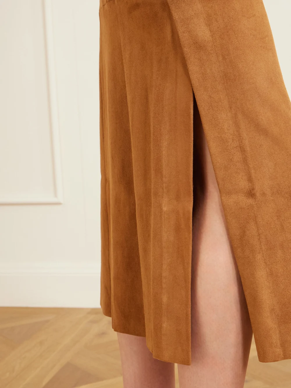 Close-up detail of the Stouls Winona Paneled Suede Midi Skirt
