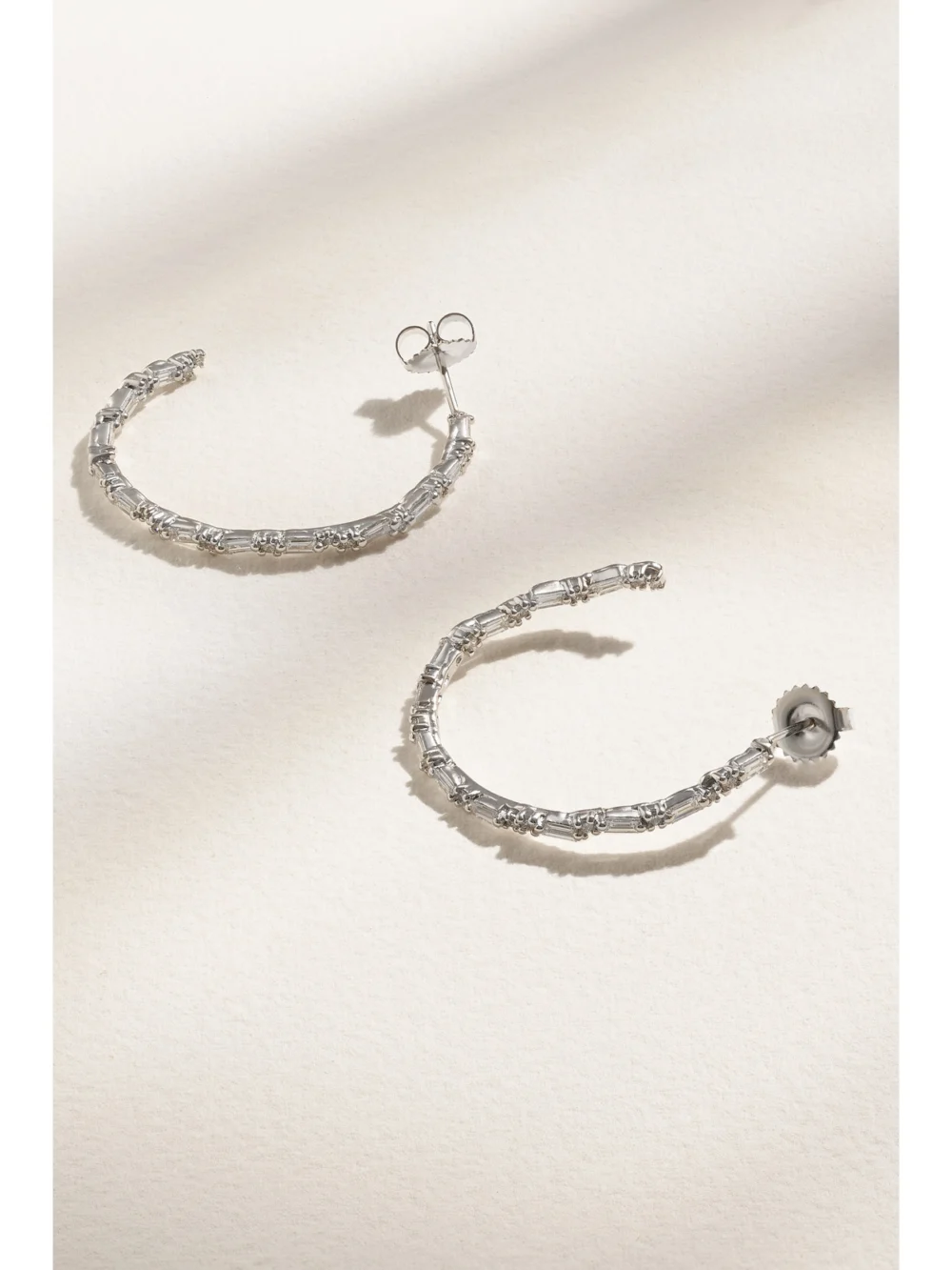 Close-up detail of the Suzanne Kalan 18-karat White Gold Diamond Hoop Earrings