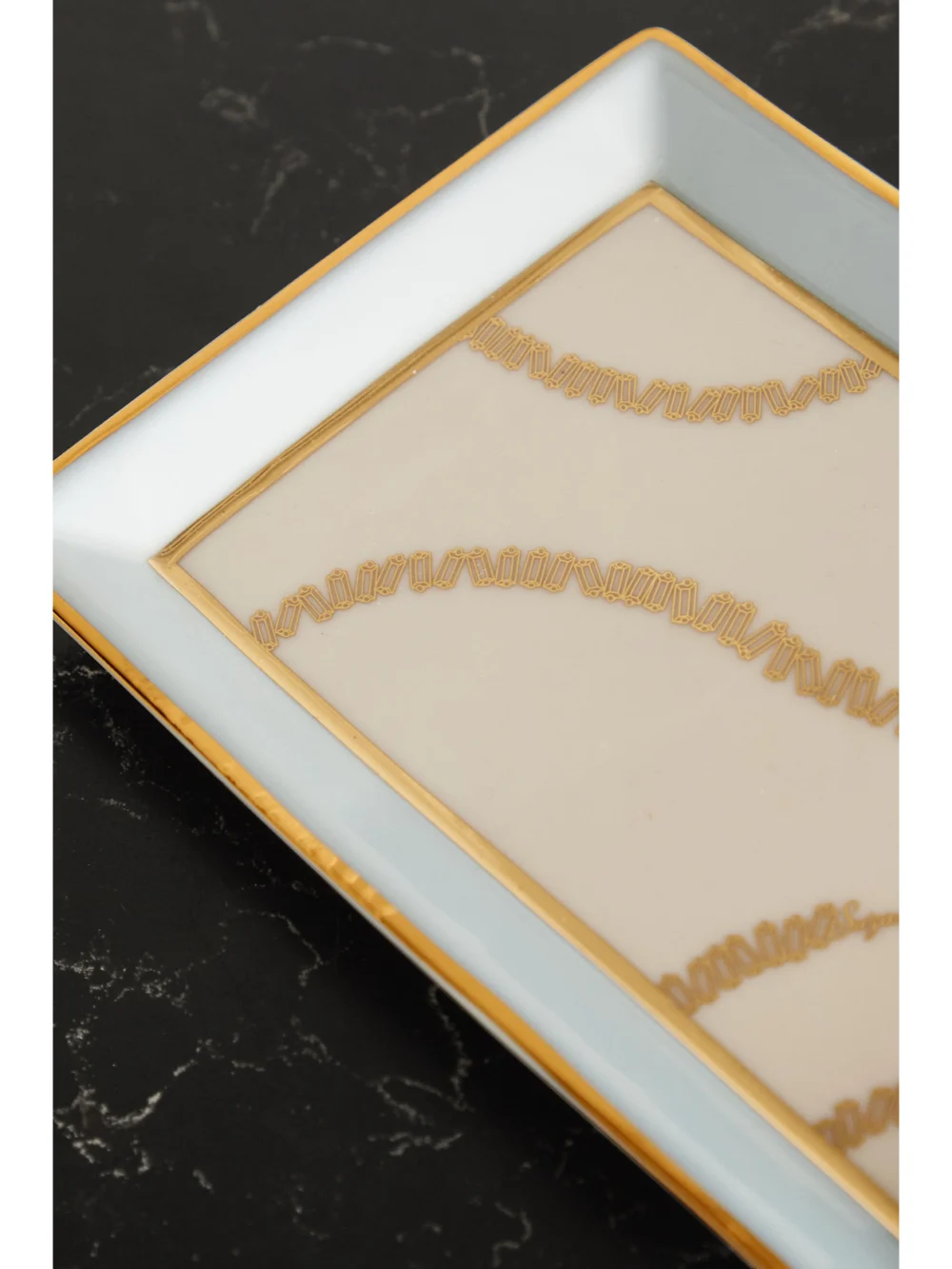 Close-up detail of the Suzanne Kalan + Jonathan Adler Porcelain Jewelry Tray
