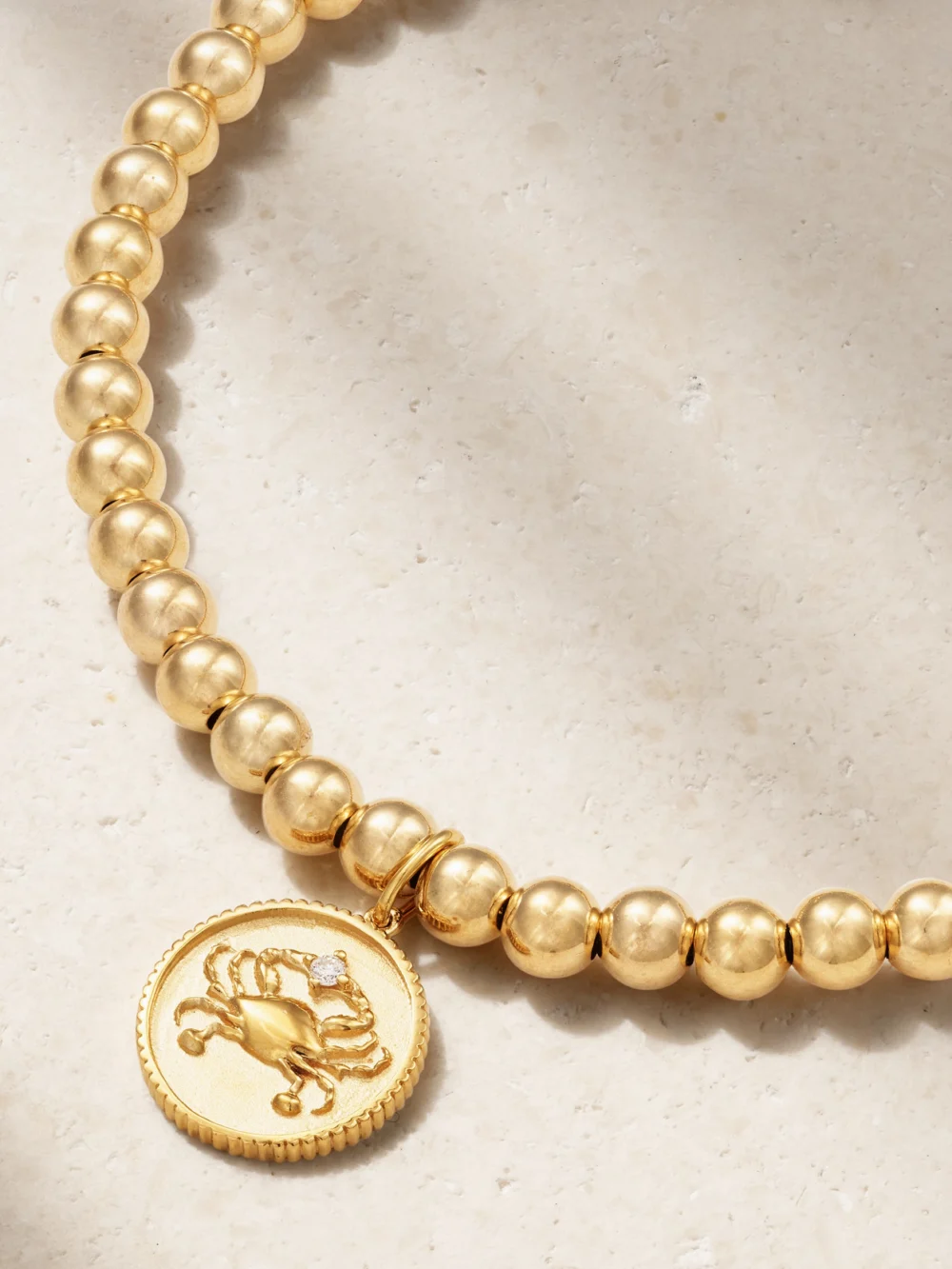 Close-up detail of the Sydney Evan Cancer 14-karat Gold Diamond Bracelet