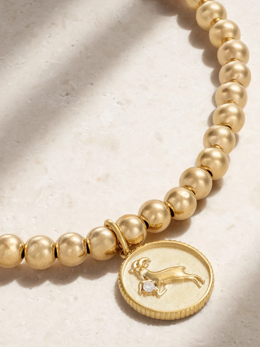 Close-up detail of the Sydney Evan Capricorn 14-karat Gold Diamond Bracelet