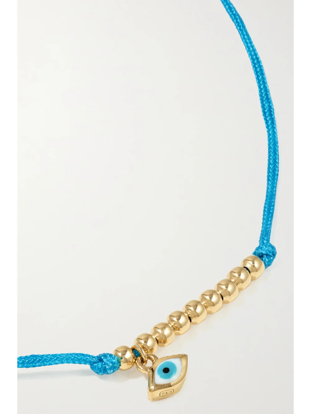 Close-up detail of the Sydney Evan Evil Eye 14-karat Gold, Cord and Enamel Bracelet