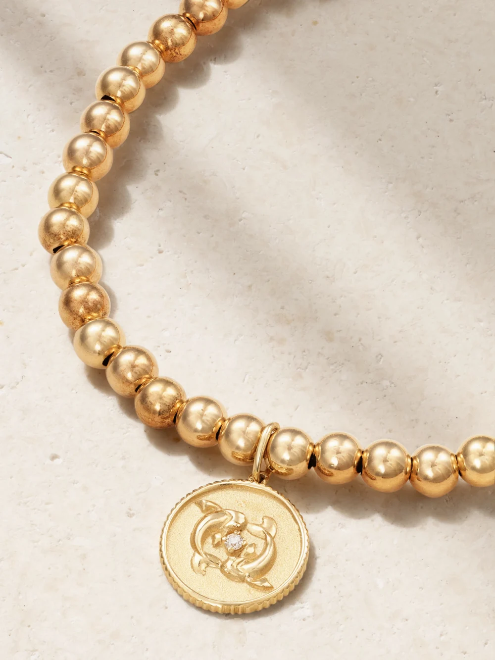 Close-up detail of the Sydney Evan Pisces 14-karat Gold Diamond Bracelet