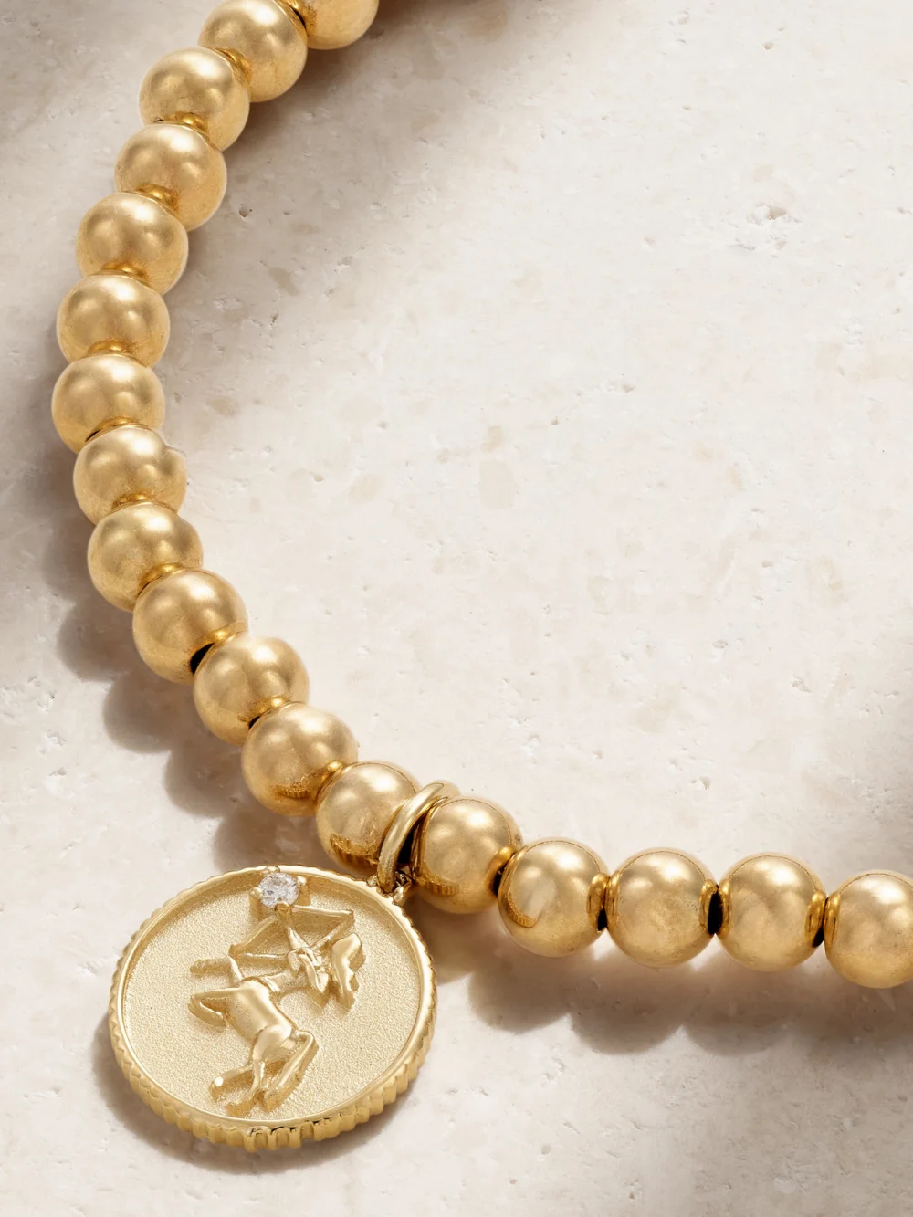 Close-up detail of the Sydney Evan Sagittarius 14-karat Gold Diamond Bracelet