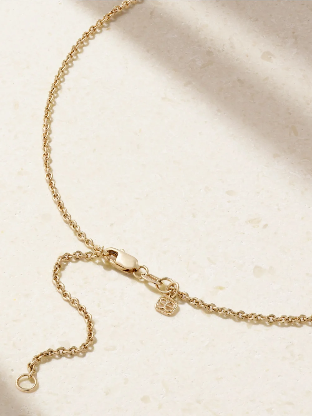 Back view of the Sydney Evan Tiny Hamsa 14-karat Gold, Enamel and Diamond Necklace