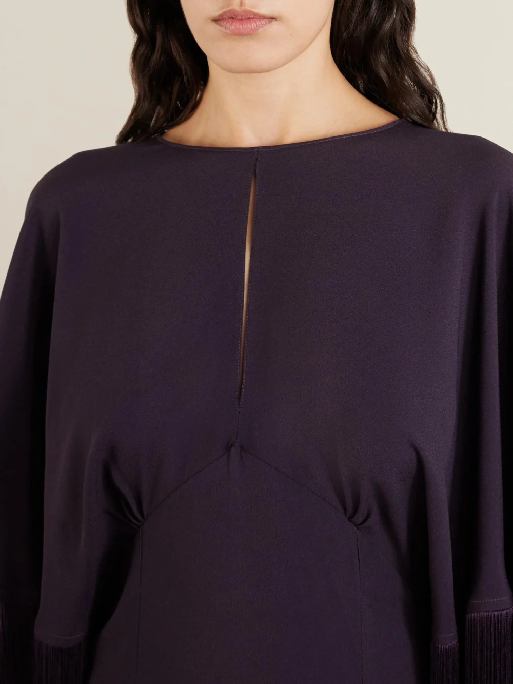 Close-up detail of the Taller Marmo 1974 Cutout Fringed Crepe Gown