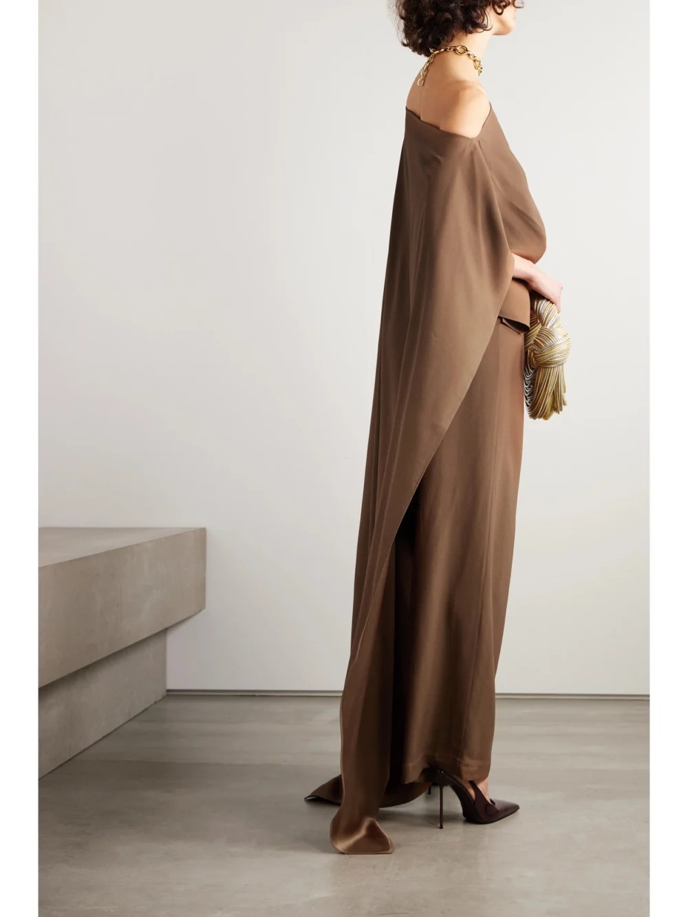Back view of the Taller Marmo Jerry Cape-effect One-shoulder Crepe Jumpsuit