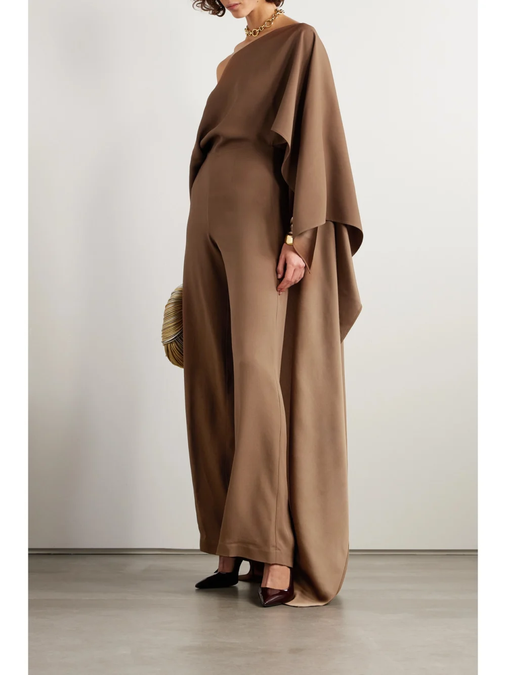 Taller Marmo Jerry Cape-effect One-shoulder Crepe Jumpsuit, worn by a model