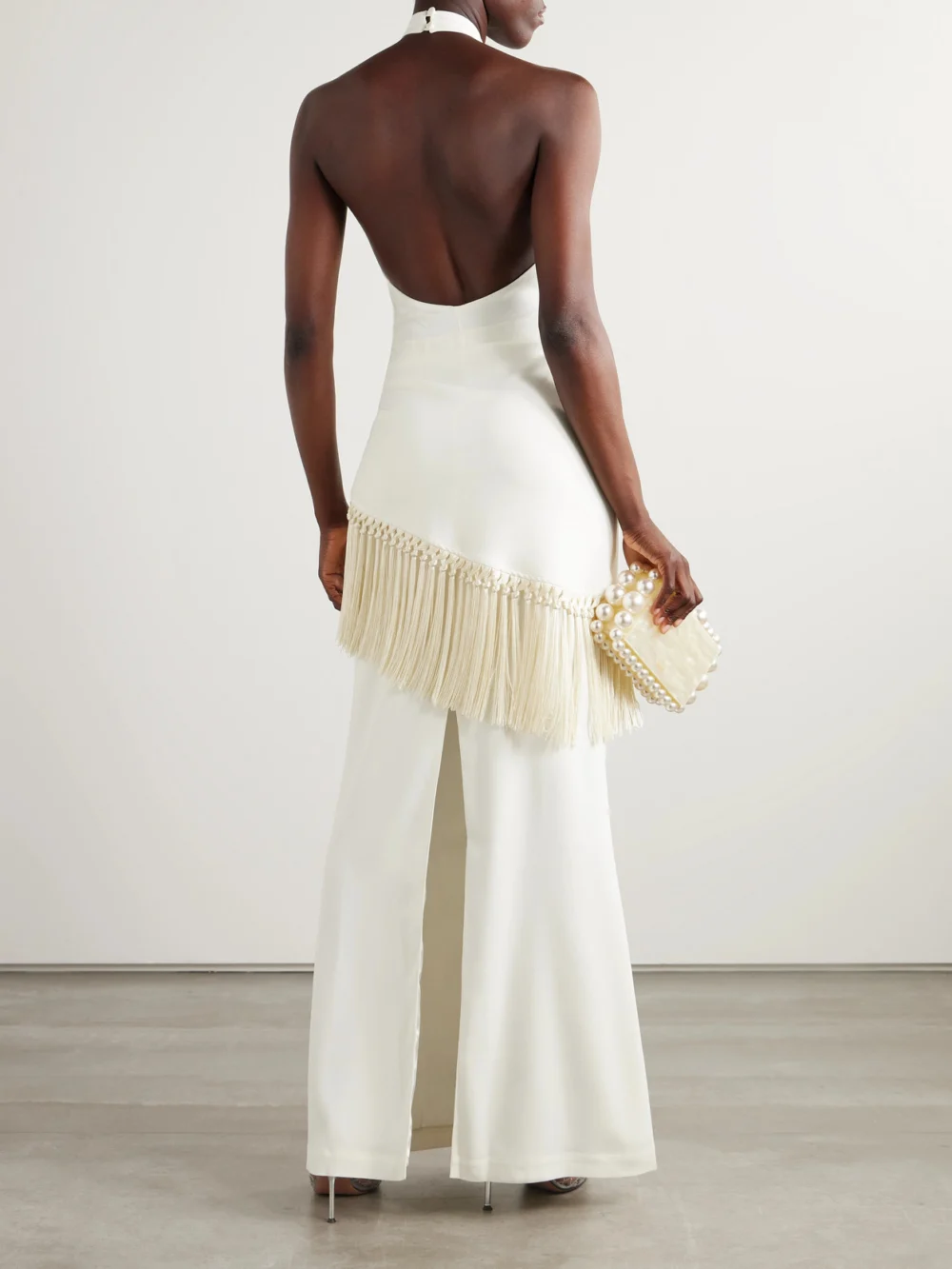 Back view of the Taller Marmo Meteora Tasseled Layered Crepe Halterneck Gown