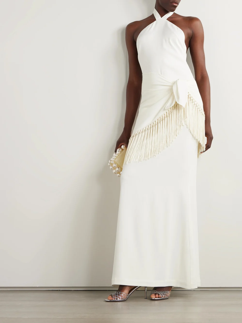 Taller Marmo Meteora Tasseled Layered Crepe Halterneck Gown, worn by a model