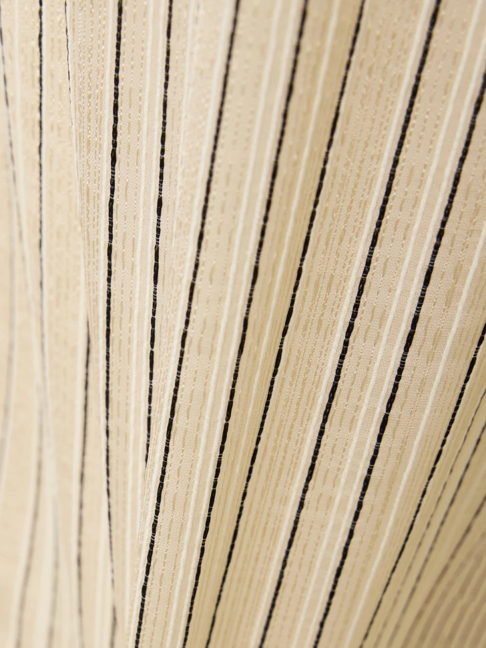 Close-up detail of the Taller Marmo Seine Metallic Pinstriped Voile Wide-leg Pants