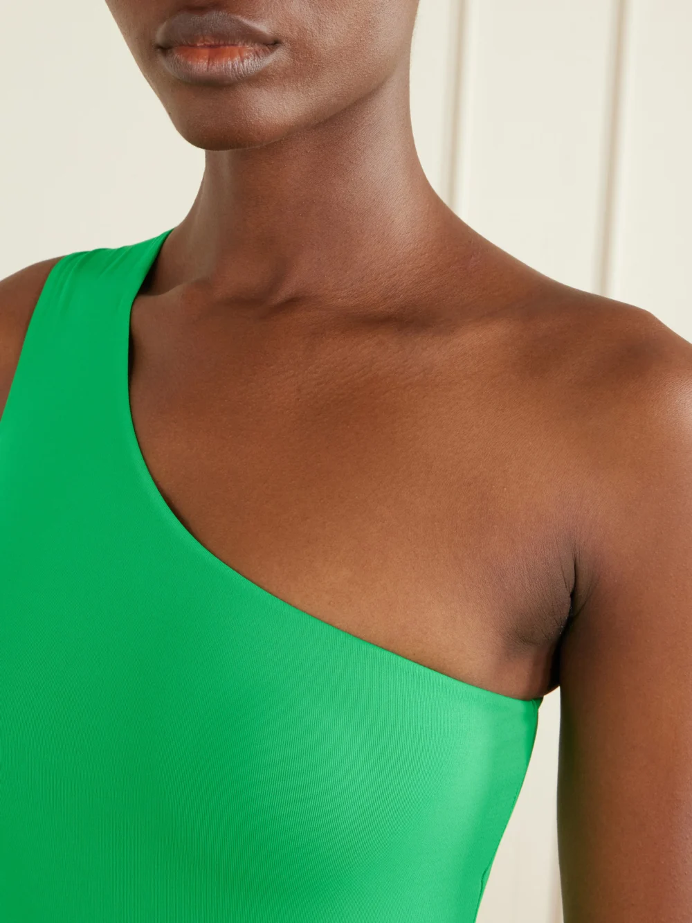 Close-up detail of the Taller Marmo Yacare Swimsuit and Fringed Pareo Set