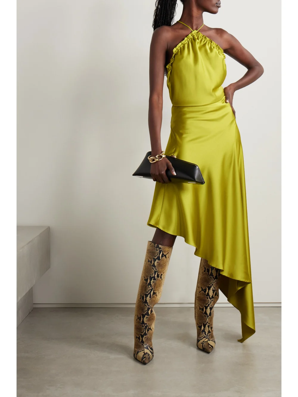 The Attico Asymmetric Feather-trimmed Satin Halterneck Midi Dress, worn by a model