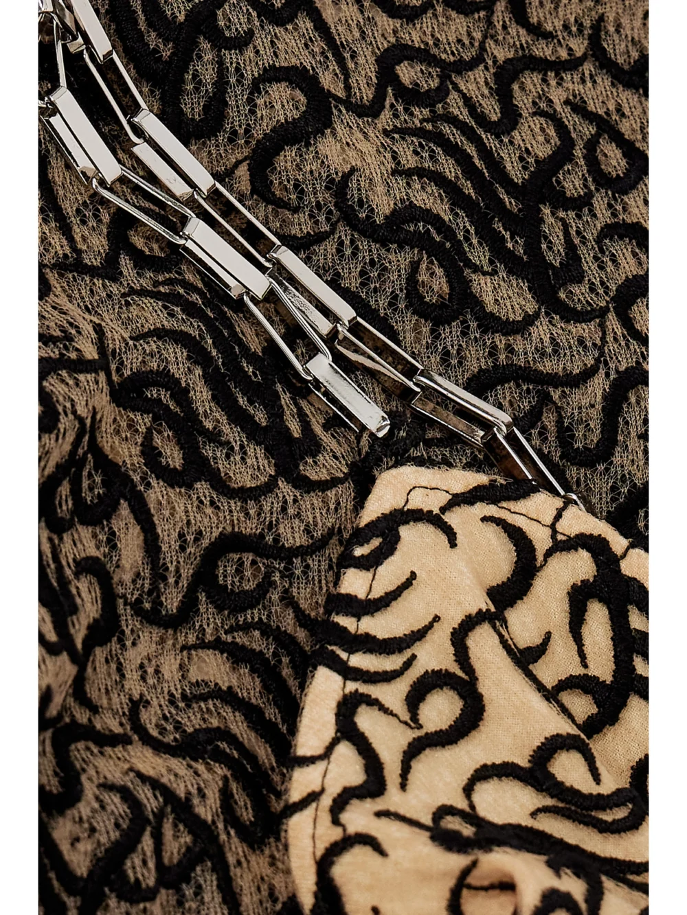 Close-up detail of The Attico Chain-embellished Embroidered Tulle Maxi Dress
