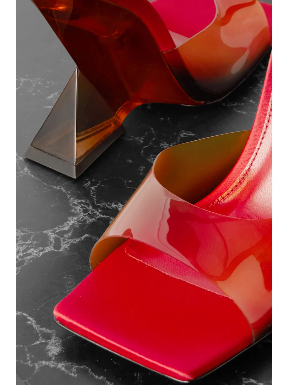 Close-up detail of The Attico Cheope Dégradé Pvc Mules