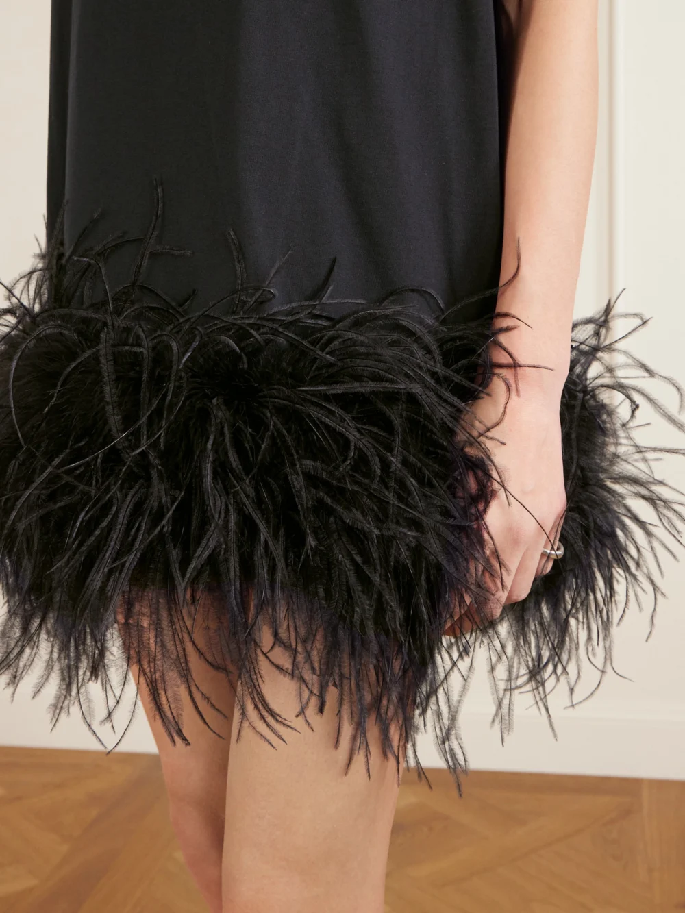 Close-up detail of The Attico Feather-trimmed Cotton-jersey Mini Dress