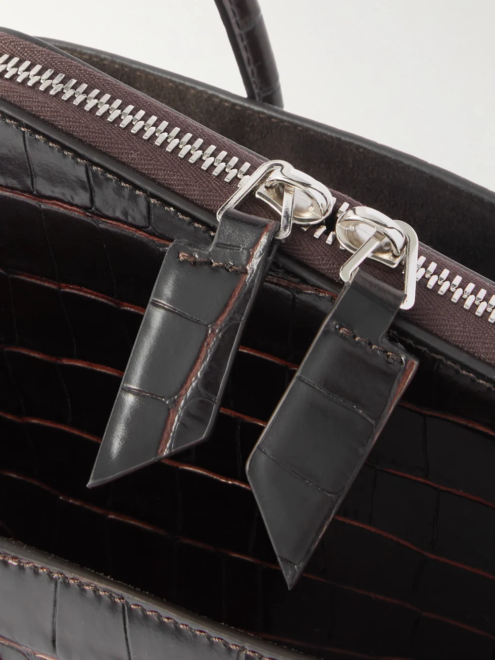 Close-up detail of The Attico La Passeggiata Small Asymmetric Croc-effect Leather Tote