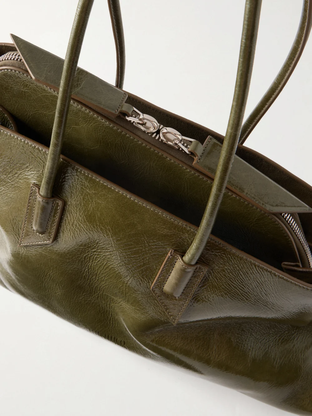 Close-up detail of The Attico La Passegiata Medium Asymmetric Shoulder Bag