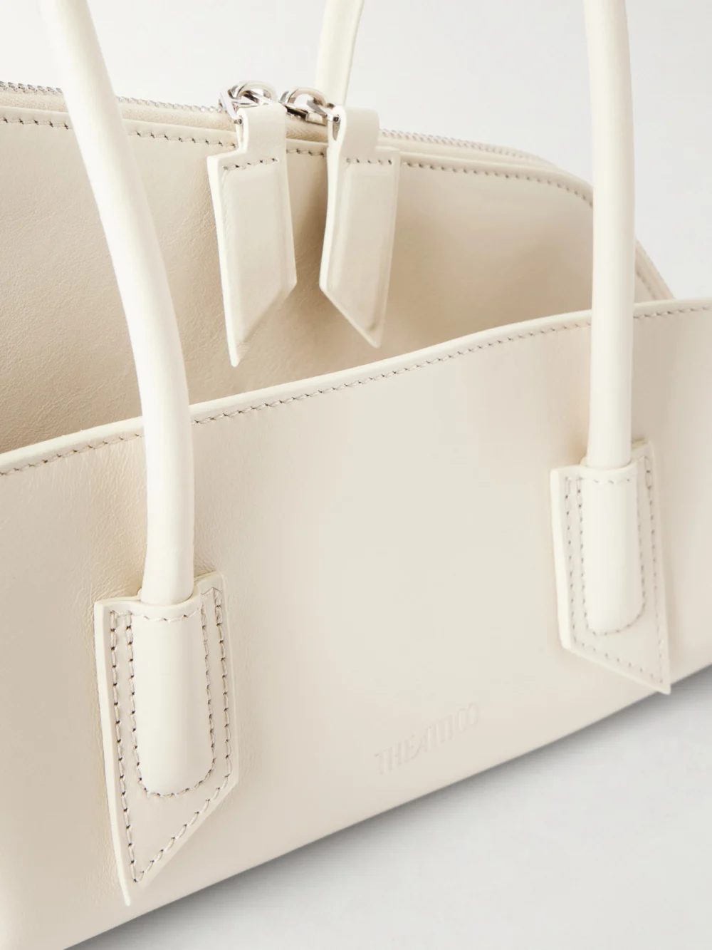 Close-up detail of The Attico La Passegiata Small Asymmetric Leather Shoulder Bag