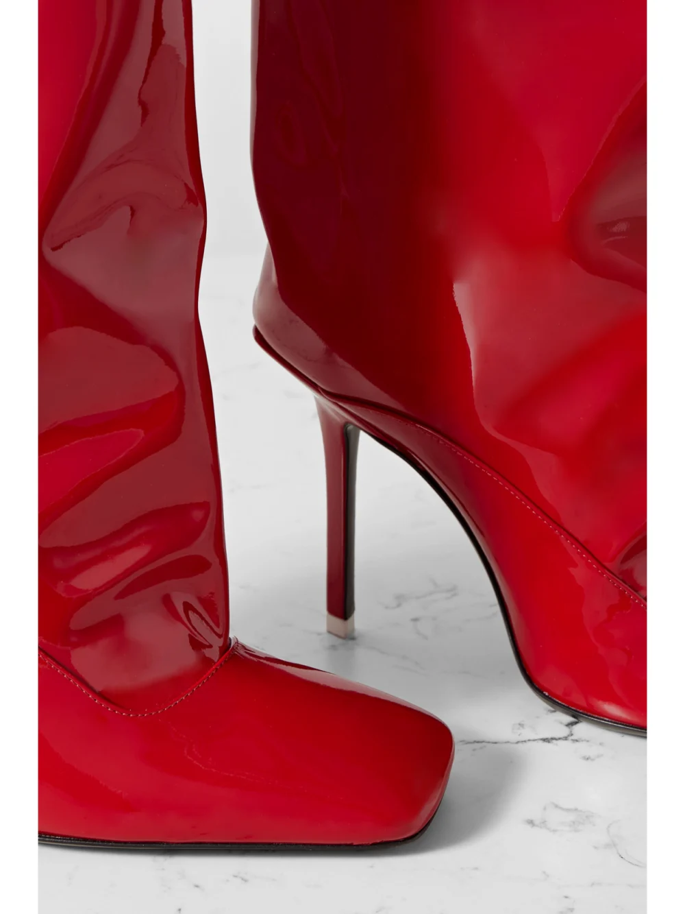 Close-up detail of The Attico Sienna Patent-leather Knee Boots