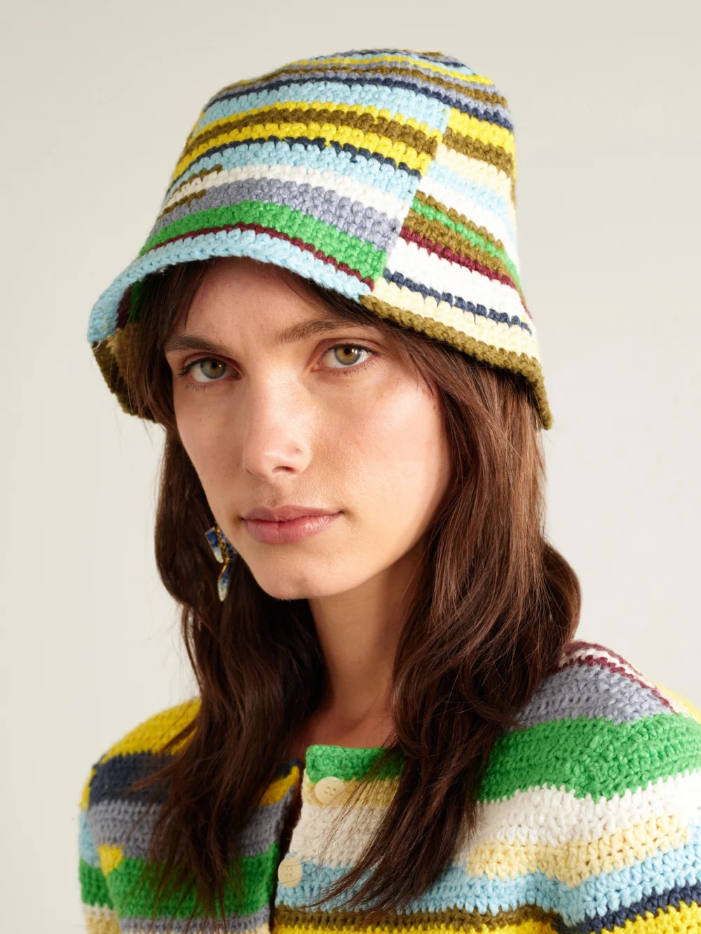 The Elder Statesman Crocheted Organic Cotton Bucket Hat, styled view