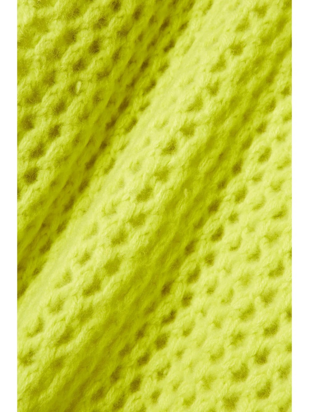 Close-up detail of The Elder Statesman Open-knit Cashmere Turtleneck Sweater