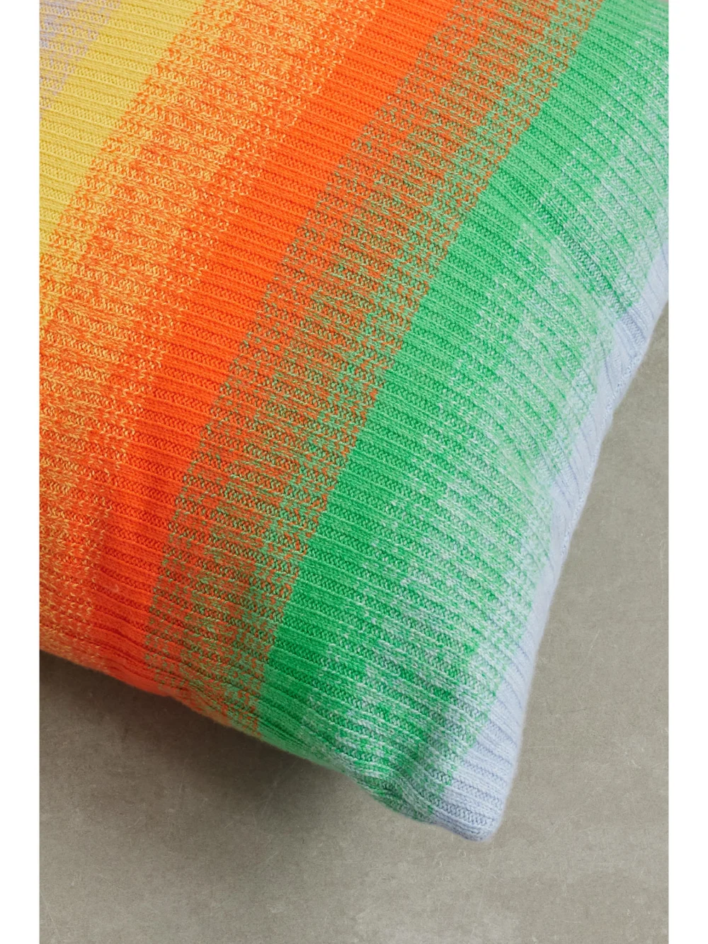 Close-up detail of The Elder Statesman Striped Ribbed Cashmere Cushion