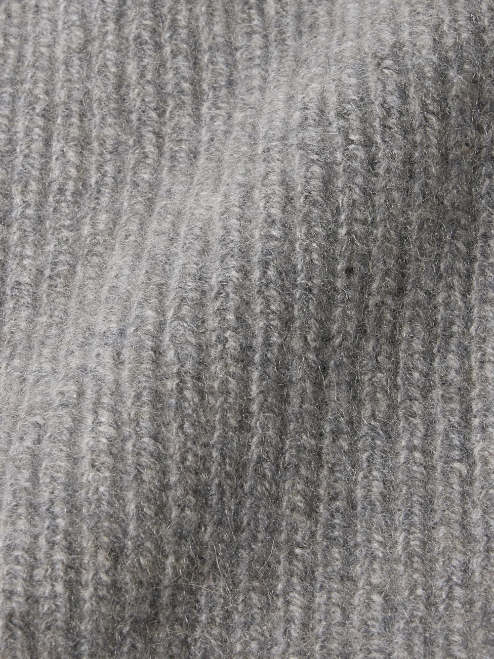 Close-up detail of The Elder Statesman Watchman Ribbed Cashmere Beanie
