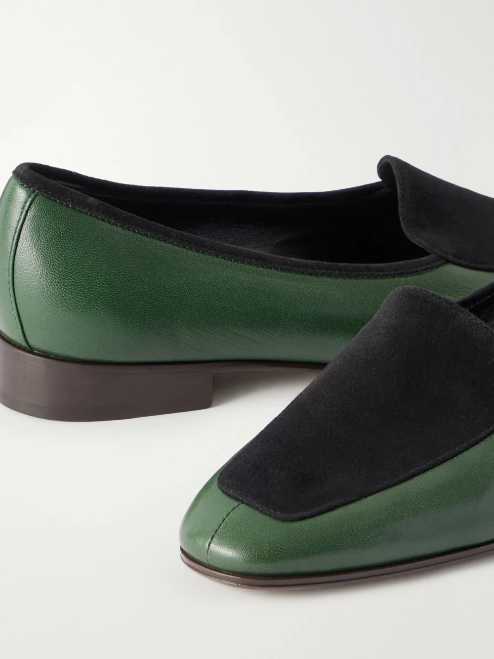 Close-up detail of The Row Adam Suede-trimmed Glossed-leather Penny Loafers