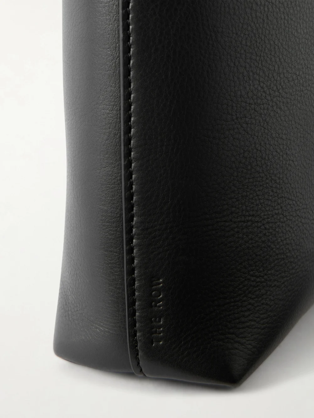Close-up detail of The Row Alma Leather Shoulder Bag