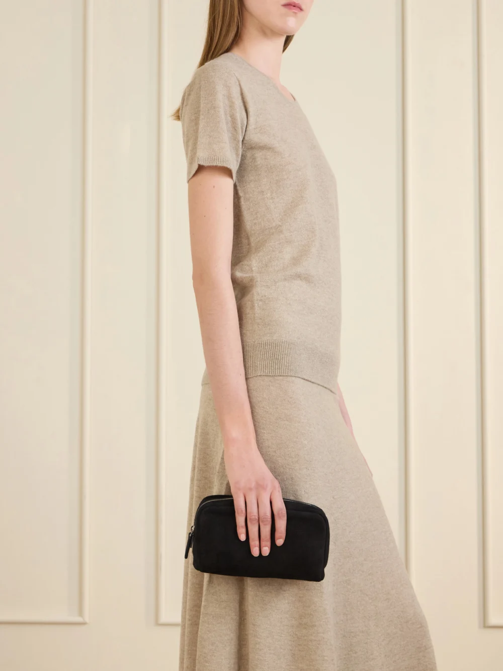 The Row Astra Suede Pouch, styled view