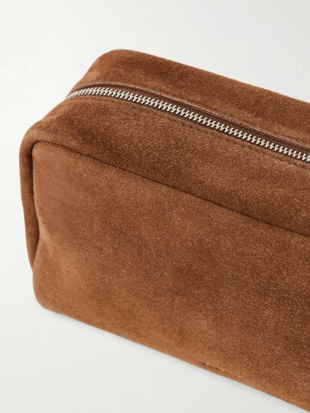 Close-up detail of The Row Astra Suede Pouch