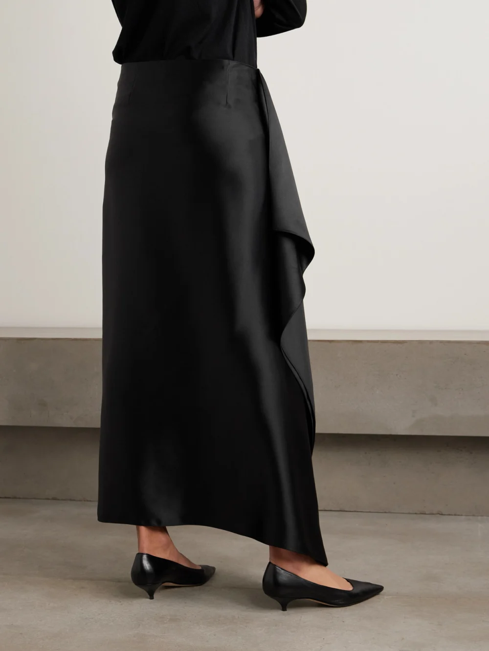 Back view of The Row Athalia Draped Duchesse Silk-satin Midi Skirt