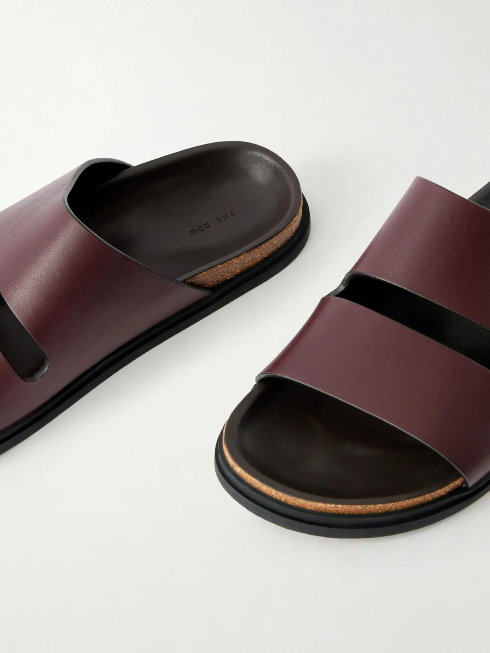 Close-up detail of The Row Band Leather Flat Sandals