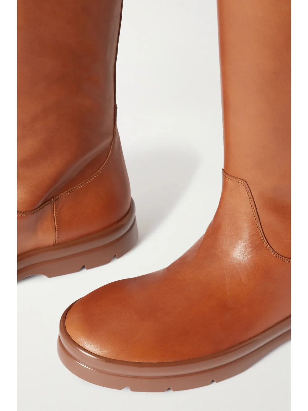 Close-up detail of The Row Billie Leather Knee Boots