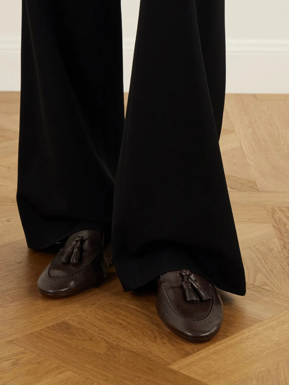 Side view of The Row Caden Tasseled Leather Loafers