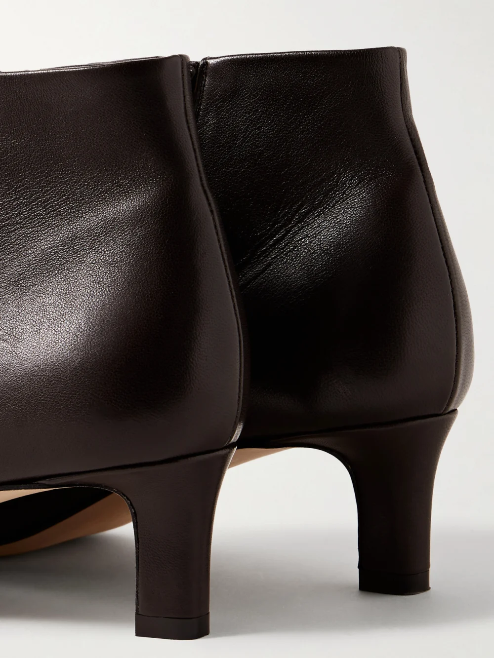 Close-up detail of The Row Carla Leather Ankle Boots