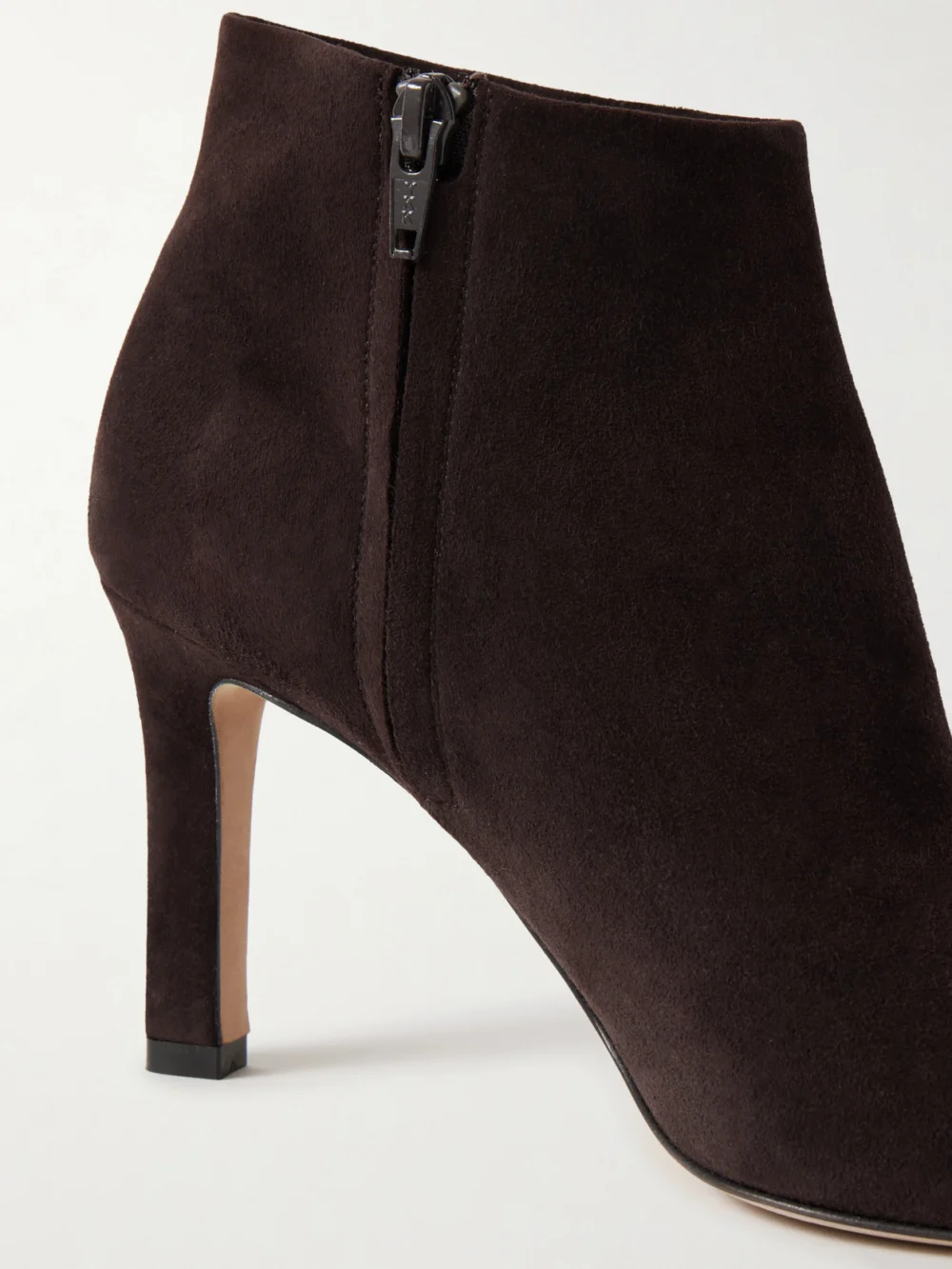 Close-up detail of The Row Carla Suede Ankle Boots