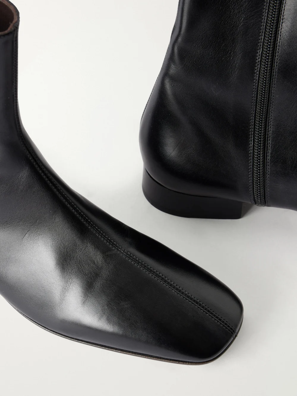 Close-up detail of The Row Cindy Leather Ankle Boots