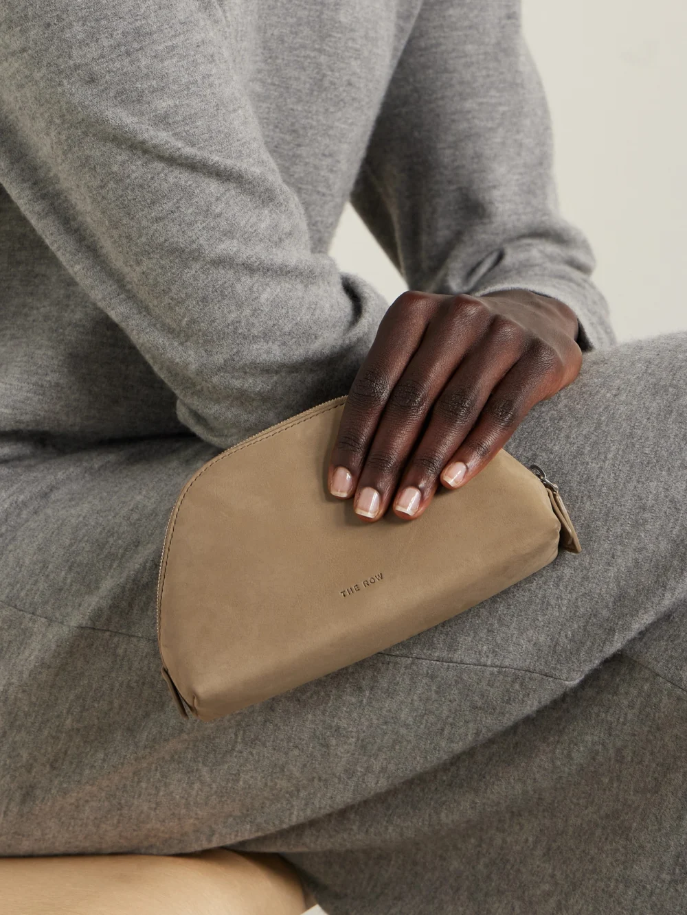 The Row Devon Mini Nubuck Pouch, styled view